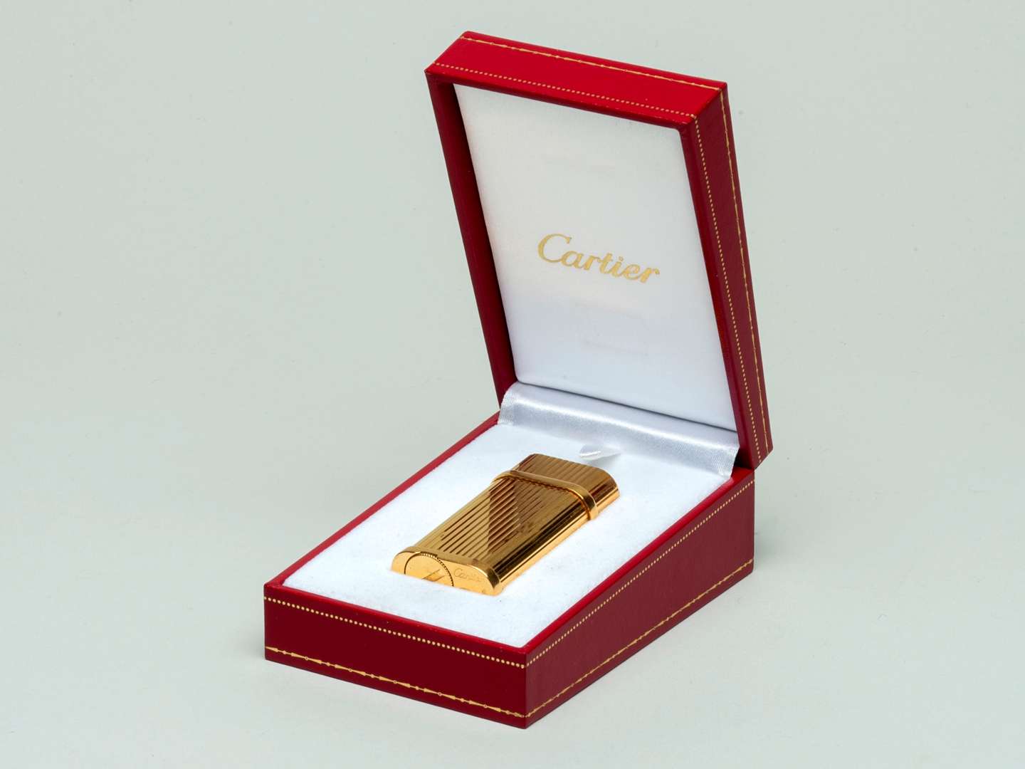 <p>Cartier lighter gold plated</p>