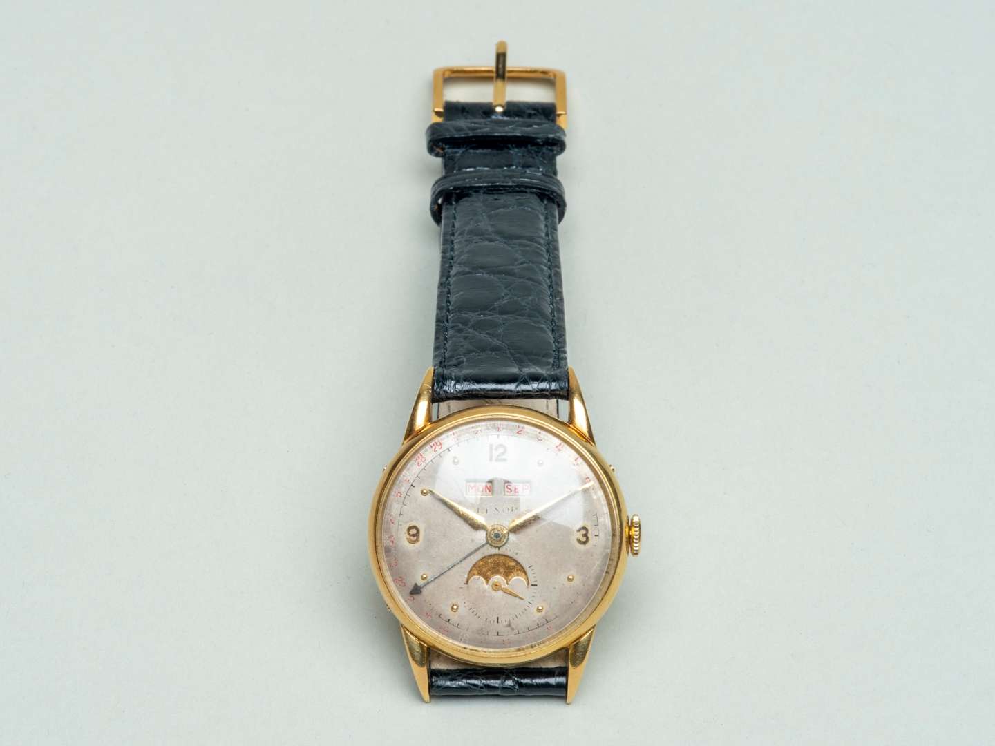 <p>Rexor 18ct moon phase watch</p>