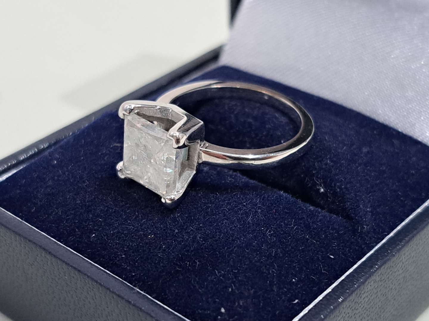 <p>14ct white gold solitaire claw set princess cut Diamond ring</p>