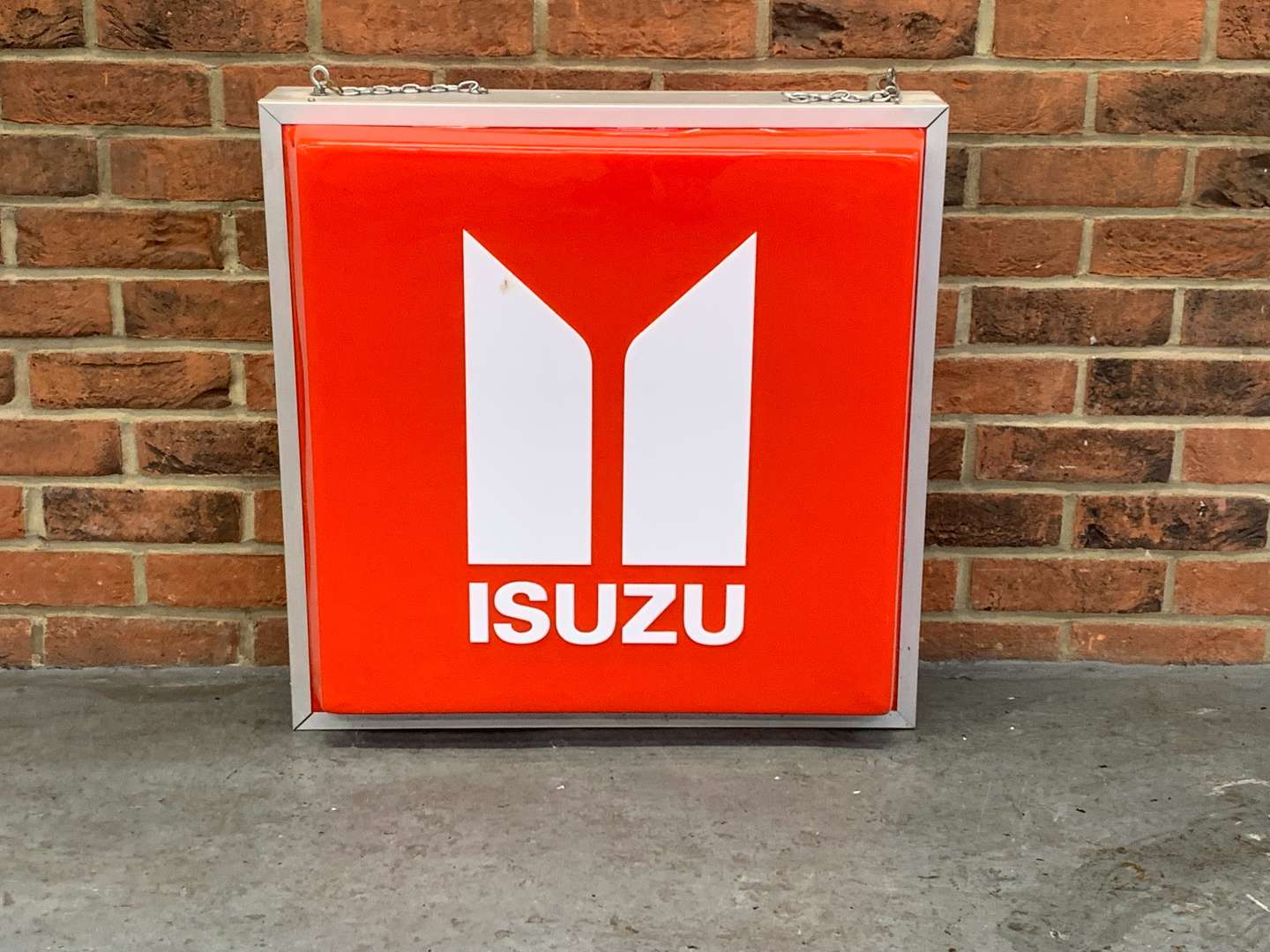 <p>Isuzu Hanging Illuminated Dealership Sign</p>