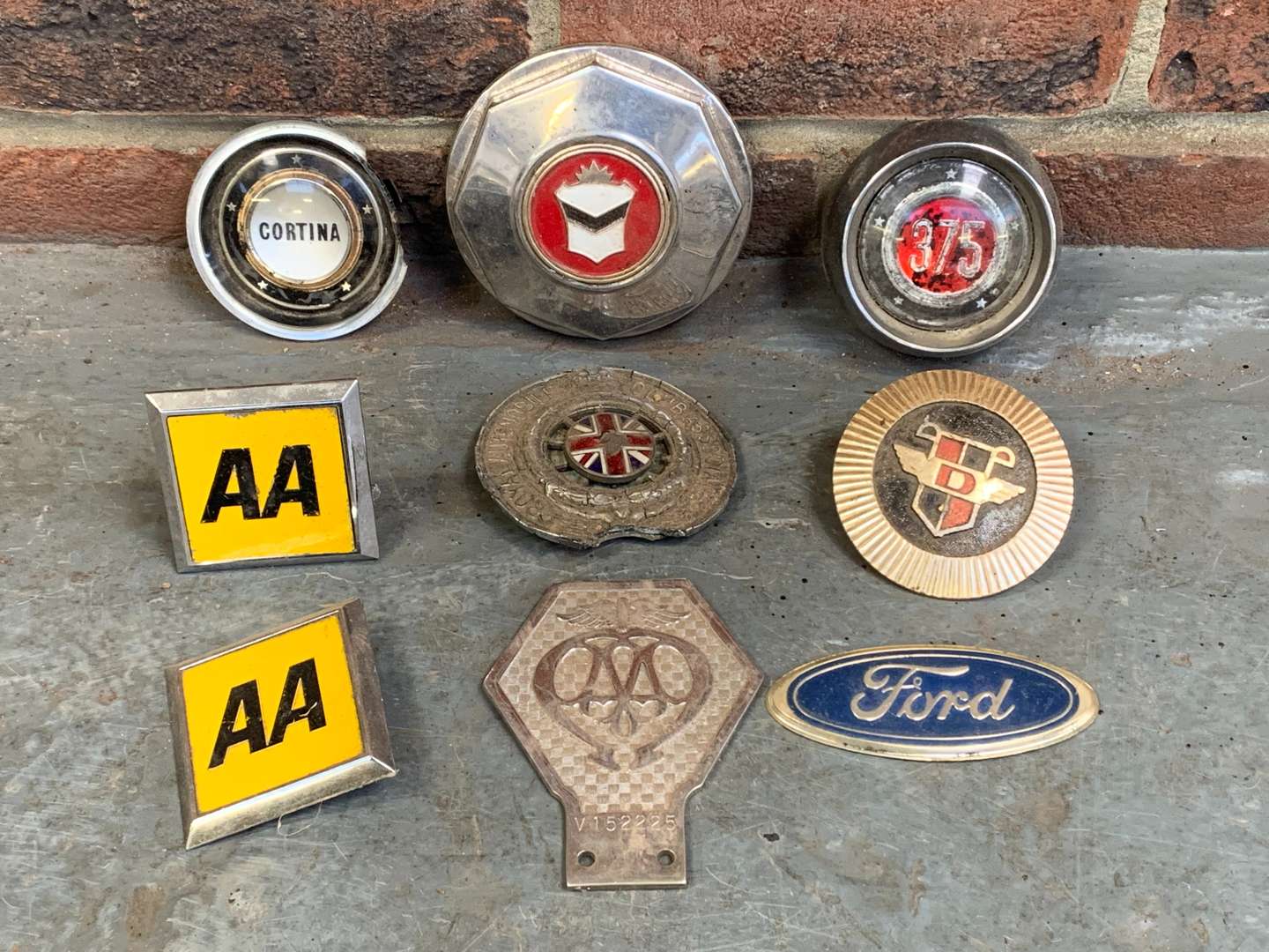 <p>Nine Classic Car Badges</p>