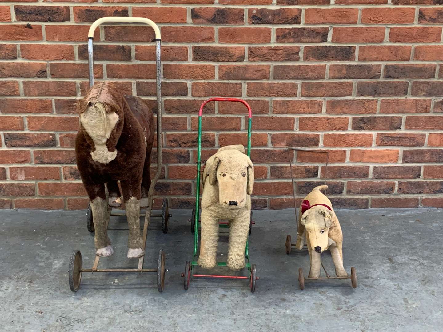 <p>Three Vintage Push Along Children's Toy's&nbsp;</p>