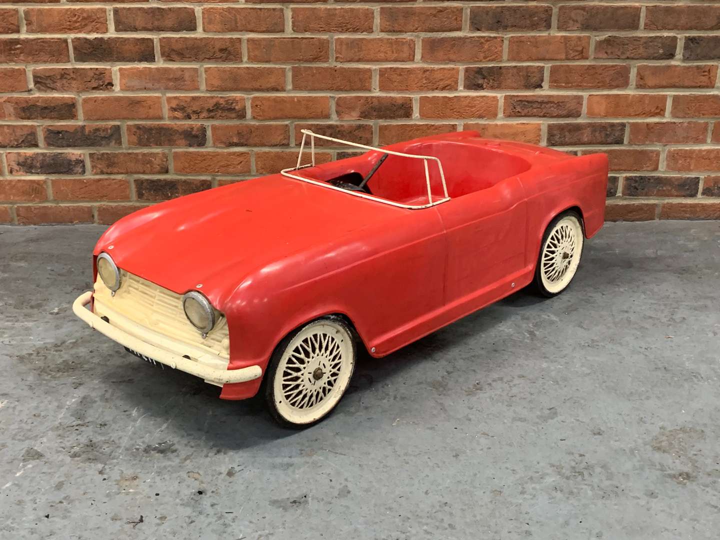 <p>Triumph TR4 Child's Plastic Pedal Car</p>