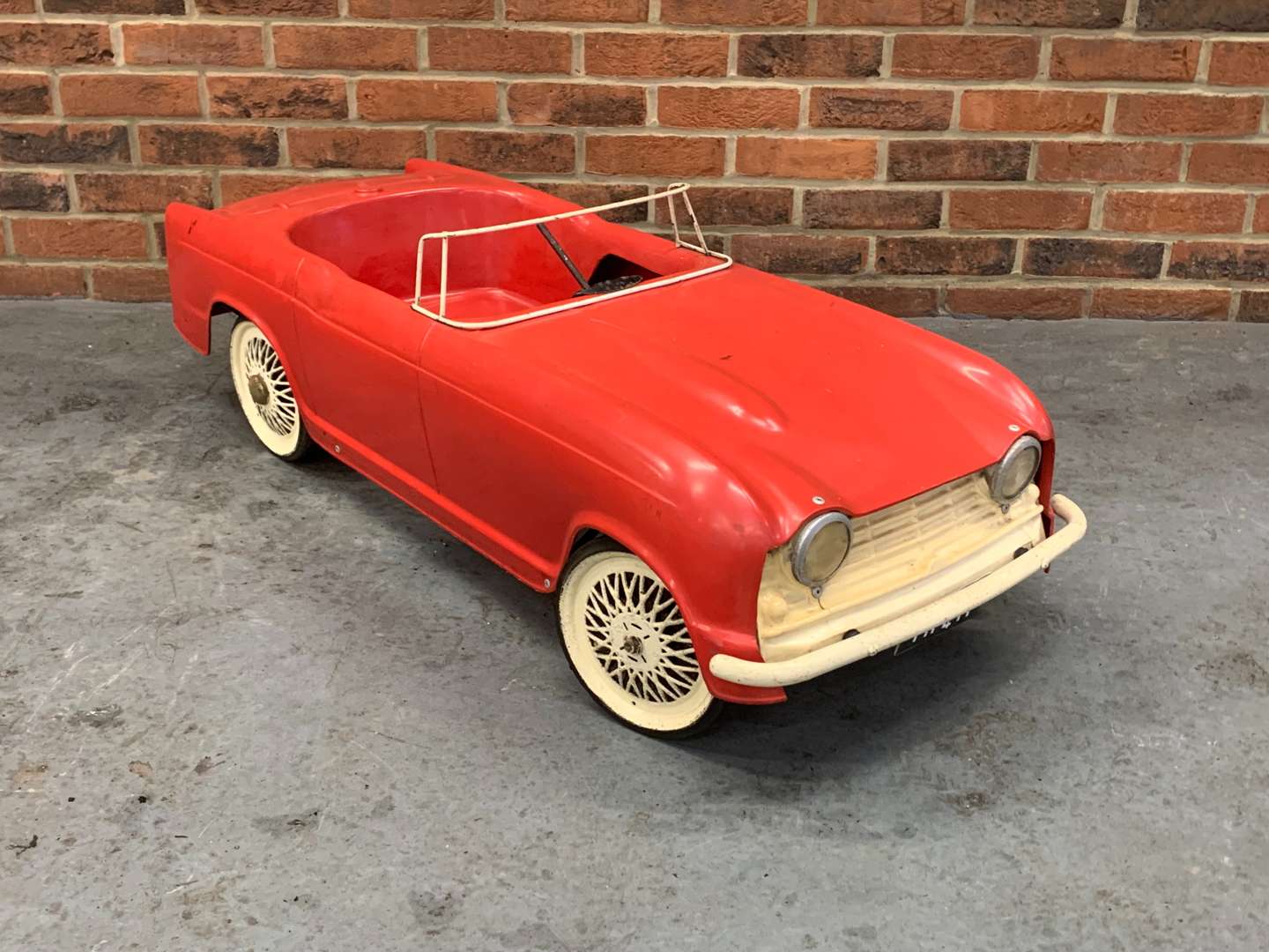 <p>Triumph TR4 Child's Plastic Pedal Car</p>