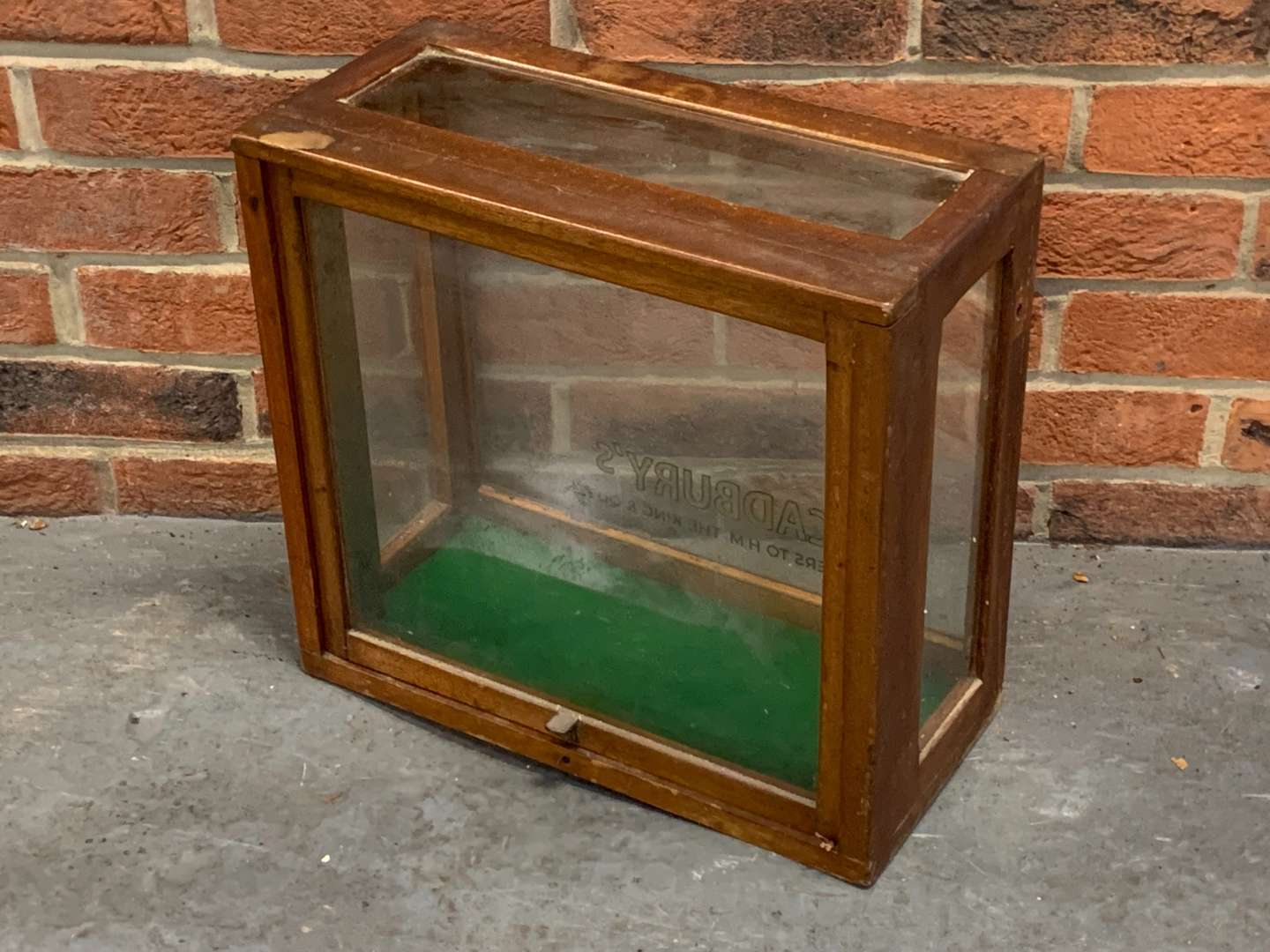 <p>Small Cadbury's Made Display Cabinet</p>