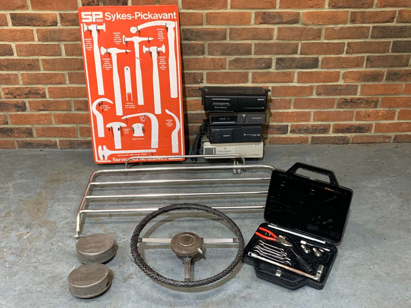 <p>TR3a Steering Wheel, Four CD Multi Changers, Tool Board Etc&nbsp;</p>