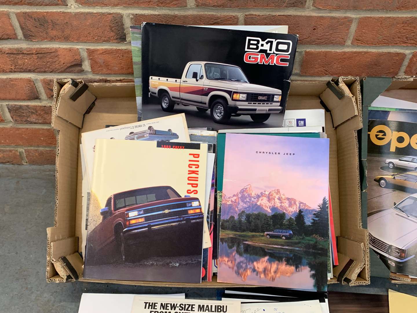 <p>Two Boxes of Mainly American Motoring Literature&nbsp;</p>