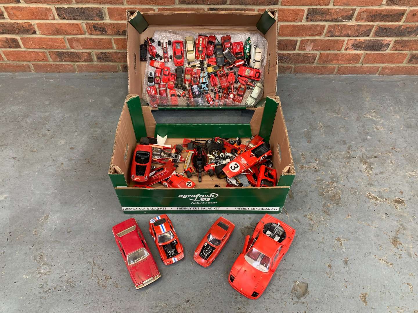 <p>Two Boxes Of Model Ferrari's&nbsp;</p>