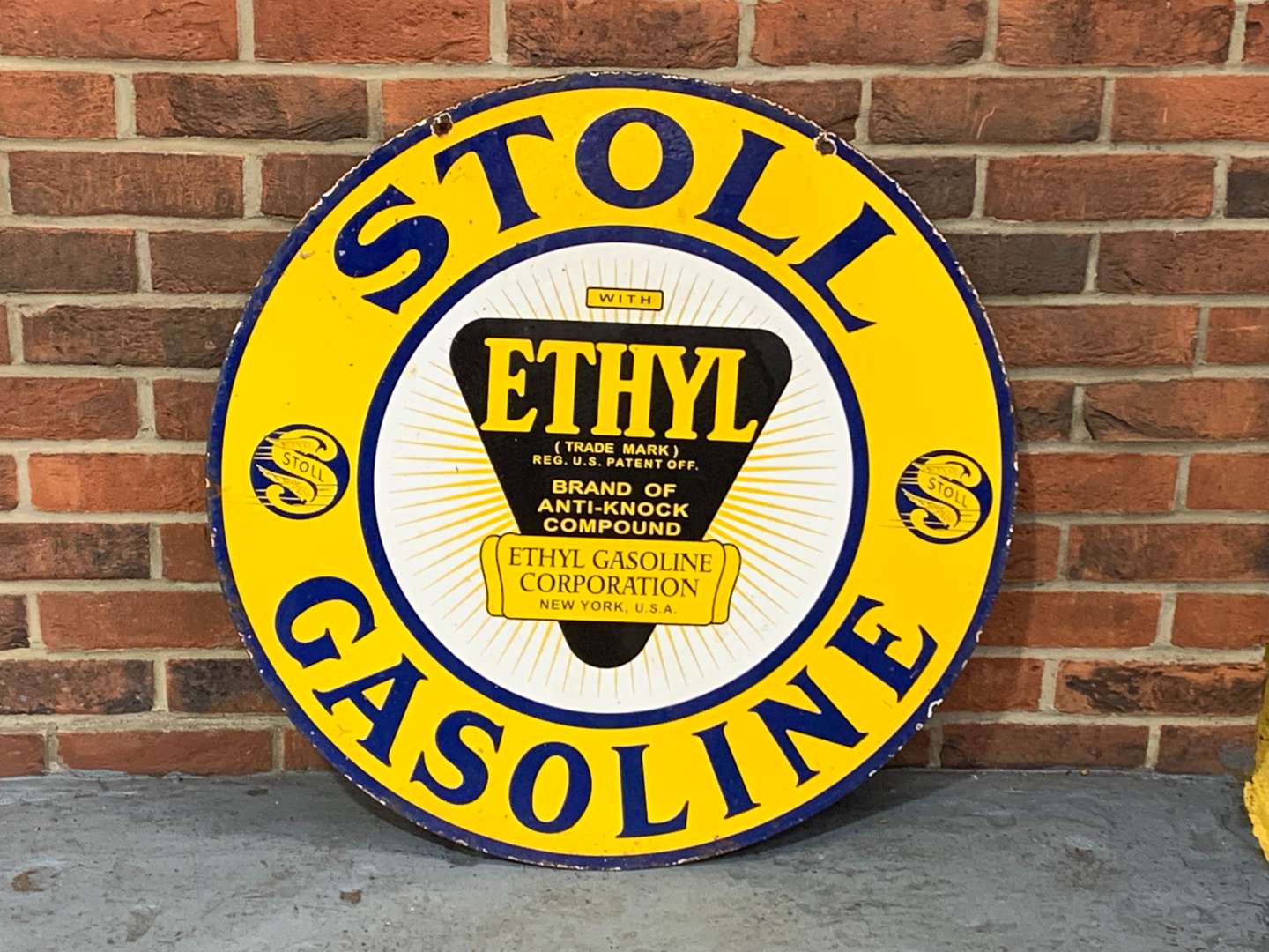 <p>Stoll Gasoline Circular Enamel Sign</p>