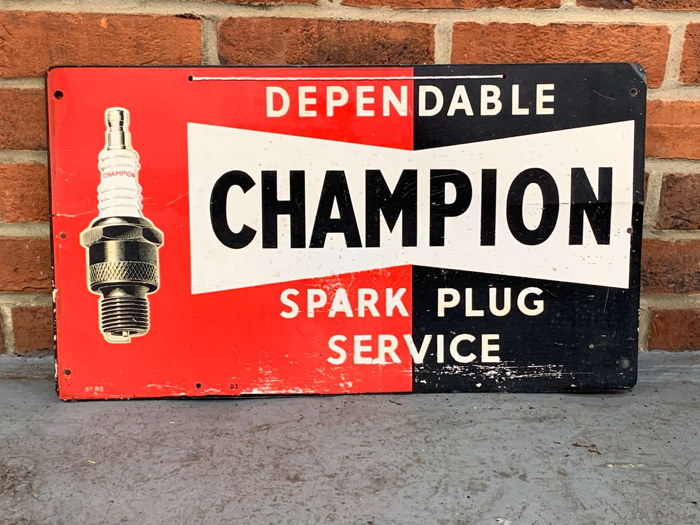 <p>Champion Spark Plug Tin Sign</p>