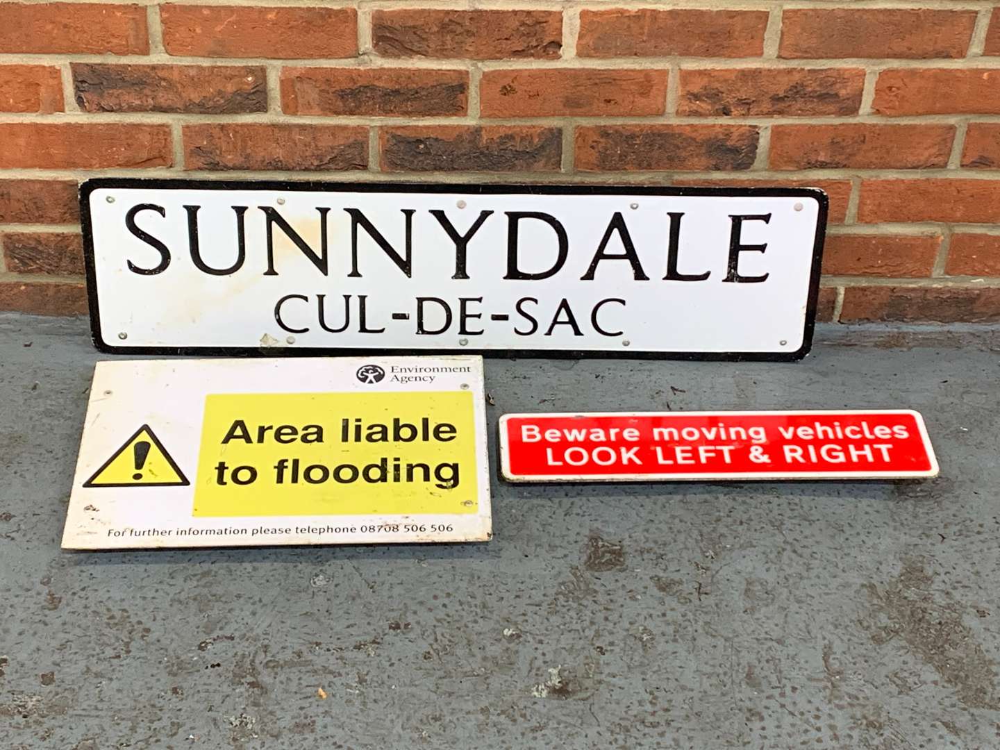 <p>Three Metal Road Signs</p>