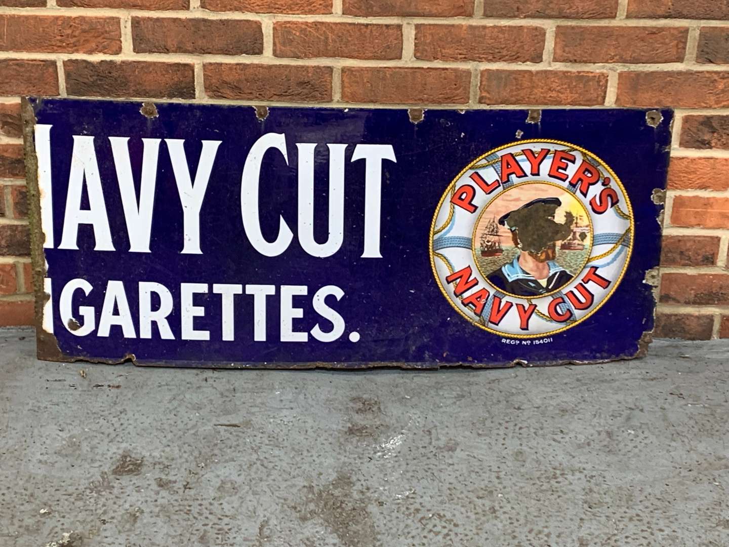 <p>Players Navy Cut Enamel Part Sign</p>