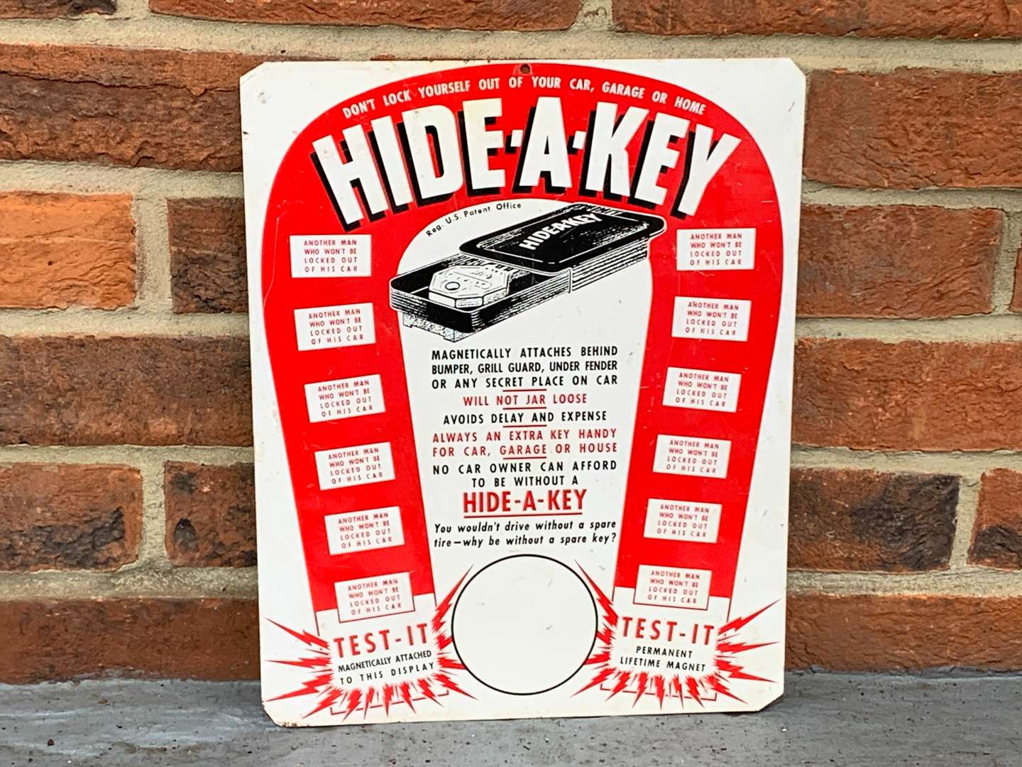 <p>Hide-A-Key Tin Sign</p>