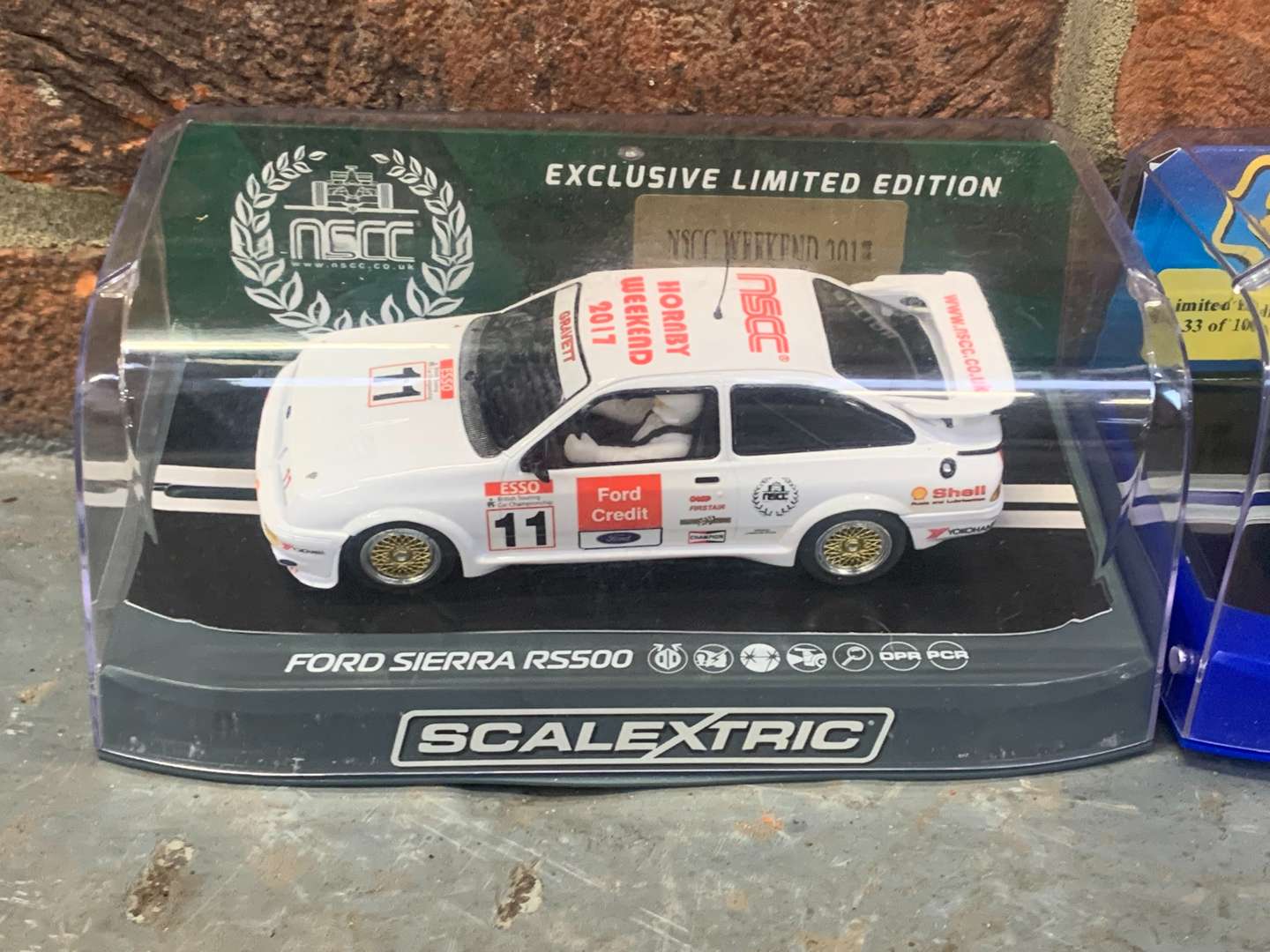 <p>Boxed Scalextric Ford Sierra RS500 and Lamborghini Aventador Cars</p>