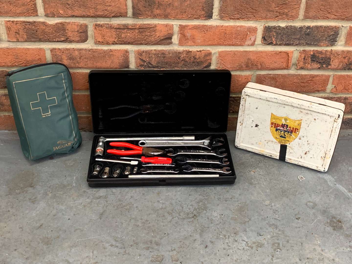 <p>Jaguar Tool Kit, First Aid Case and One Other</p>