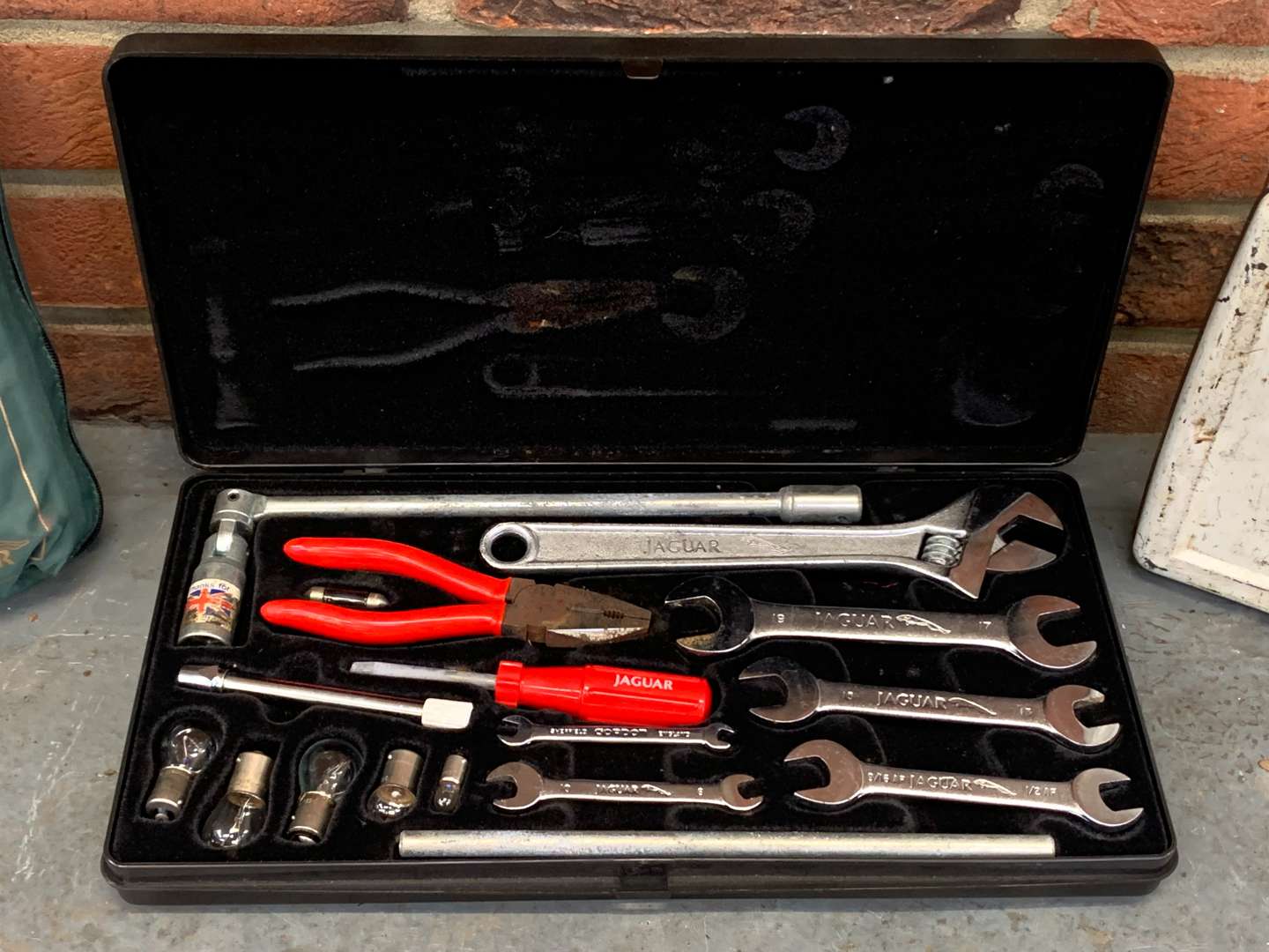 <p>Jaguar Tool Kit, First Aid Case and One Other</p>