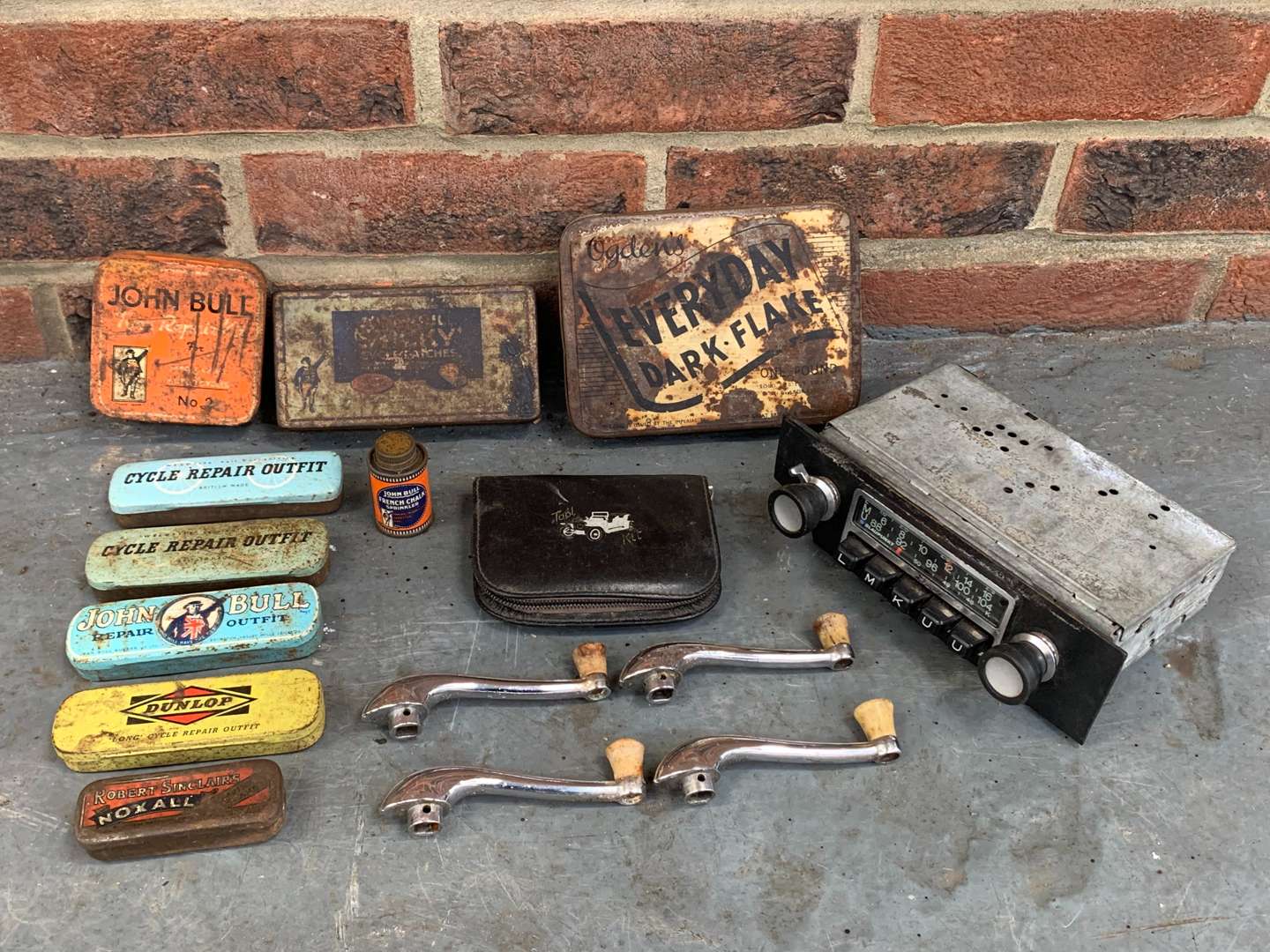 <p>Mixed Lot of Tins Radio and Door Handles</p>