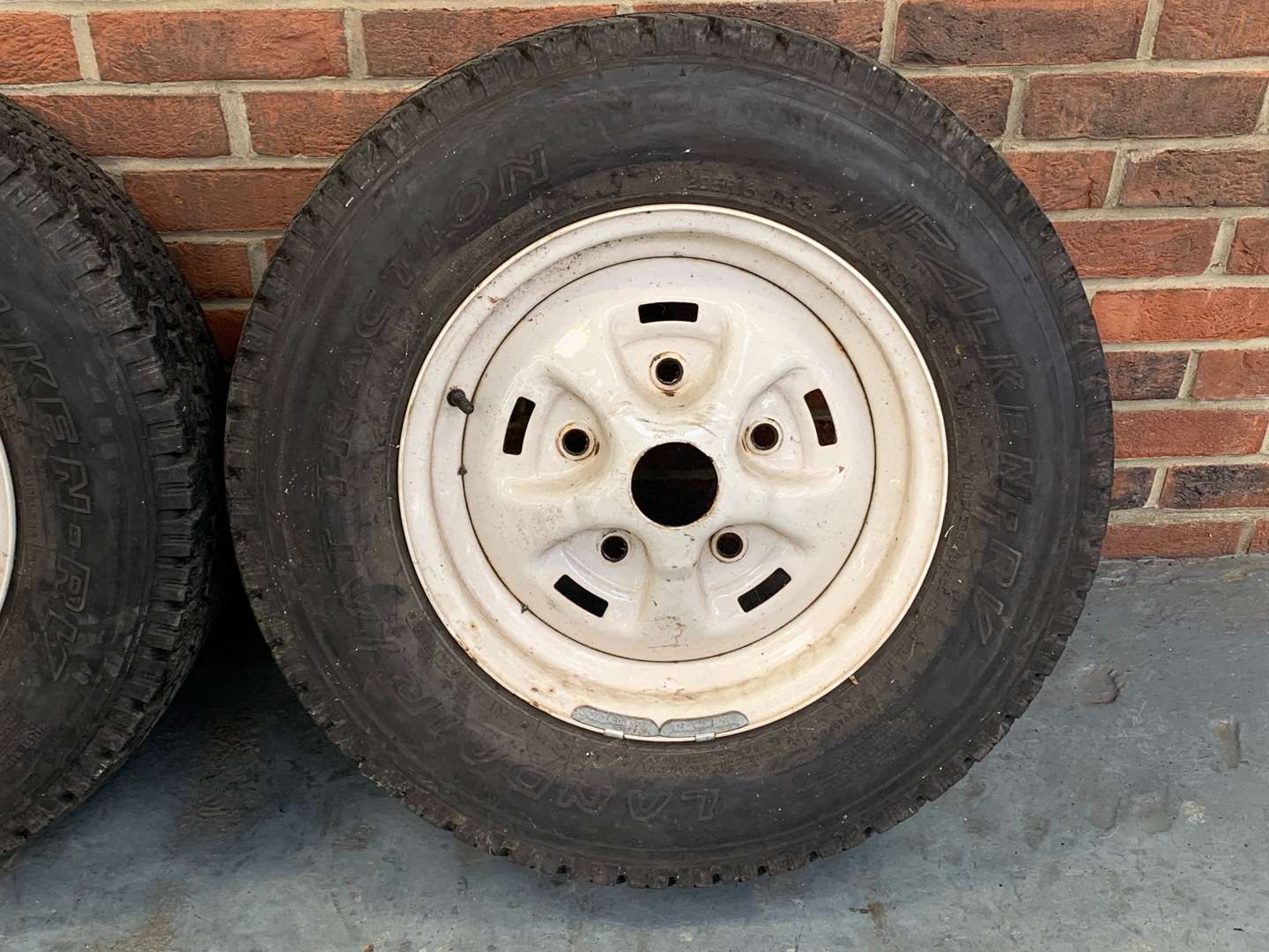 <p>Set of Four Steel Rimmed Land Rover Wheels</p>