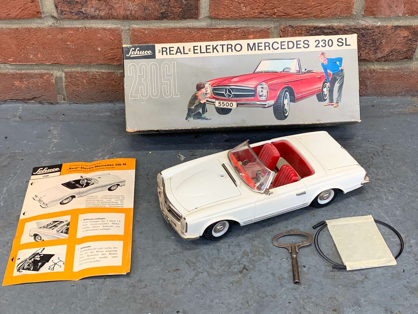 <p>Schuco Boxed Clockwork Mercedes 230SL</p>