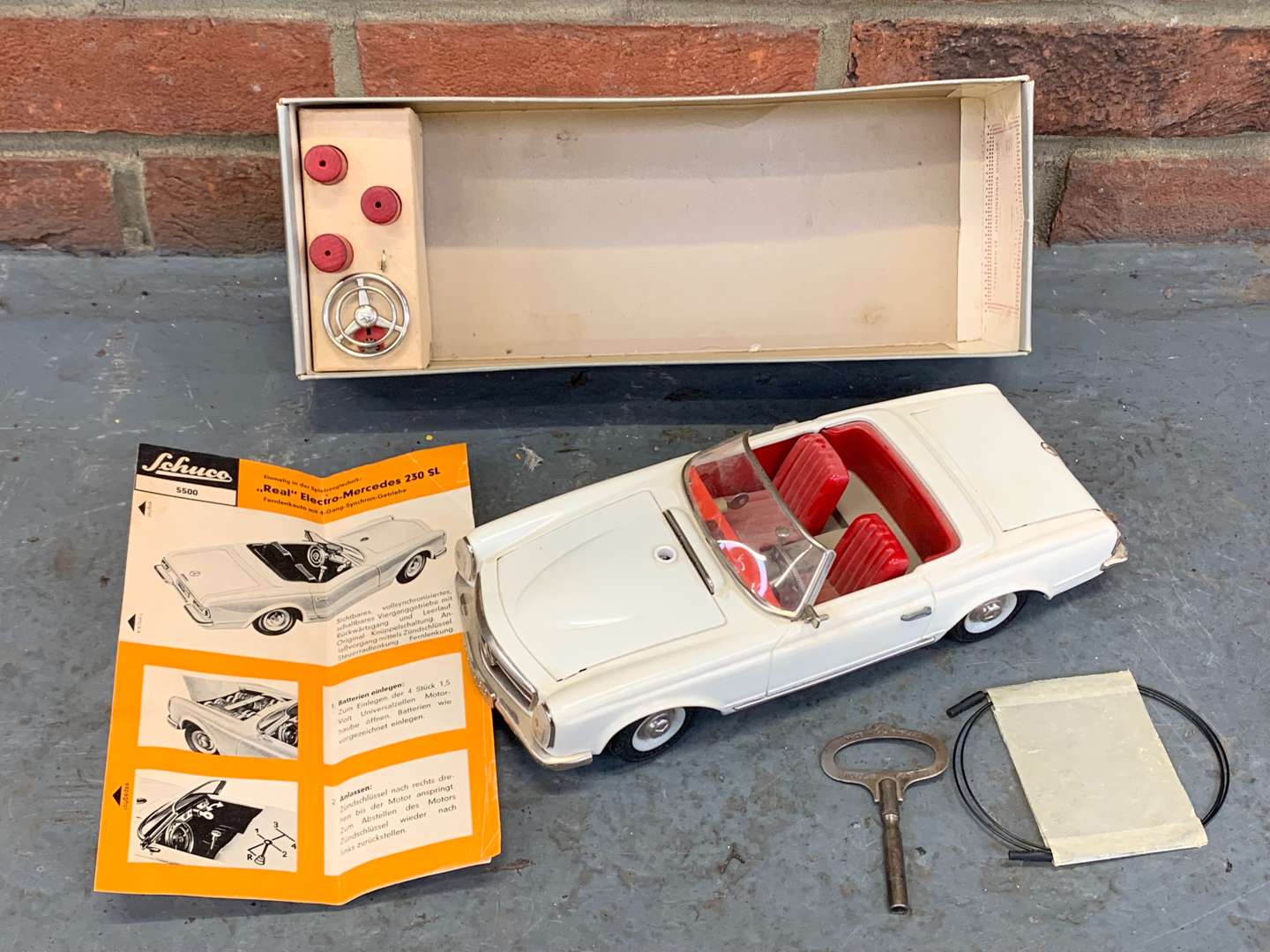 <p>Schuco Boxed Clockwork Mercedes 230SL</p>