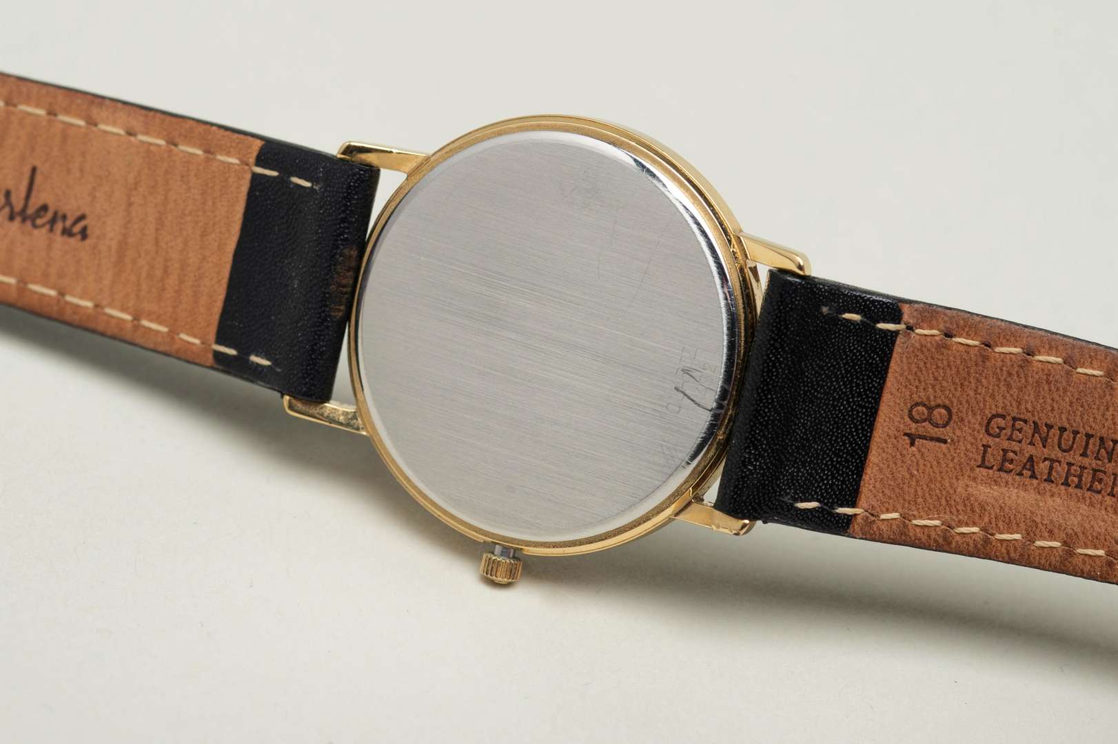 <p>OMEGA, a modern gold plated, quartz, centre seconds, calendar wristwatch.</p>