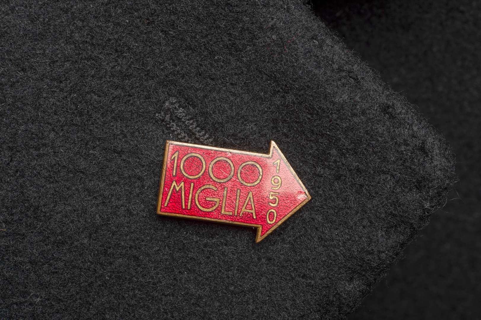 <p>MILLE MIGLIA, a 1950 Mille Miglia lapel badge, by S. Johnson-Milano</p>