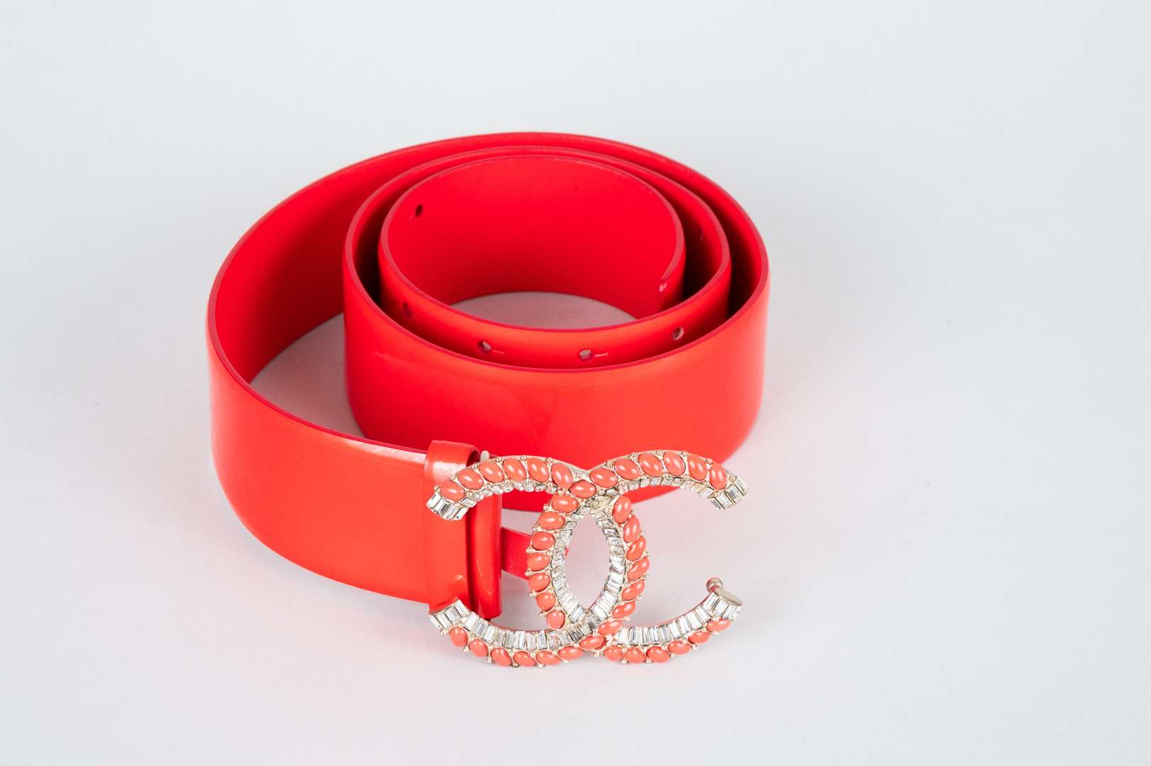 <p>CHANEL, coral red, patent leather belt</p>