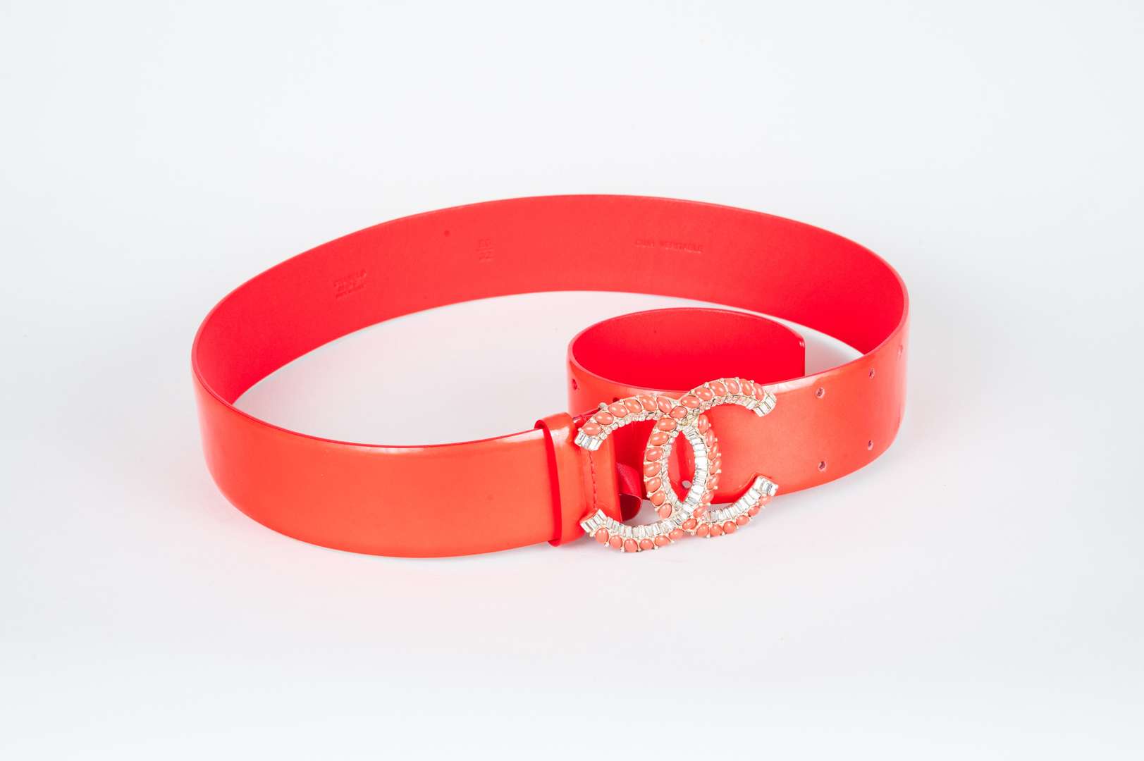 <p>CHANEL, coral red, patent leather belt</p>