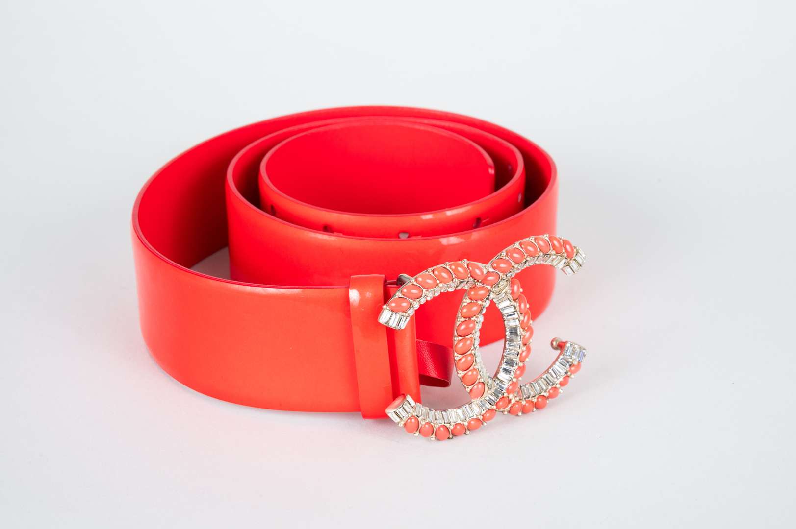 <p>CHANEL, coral red, patent leather belt</p>