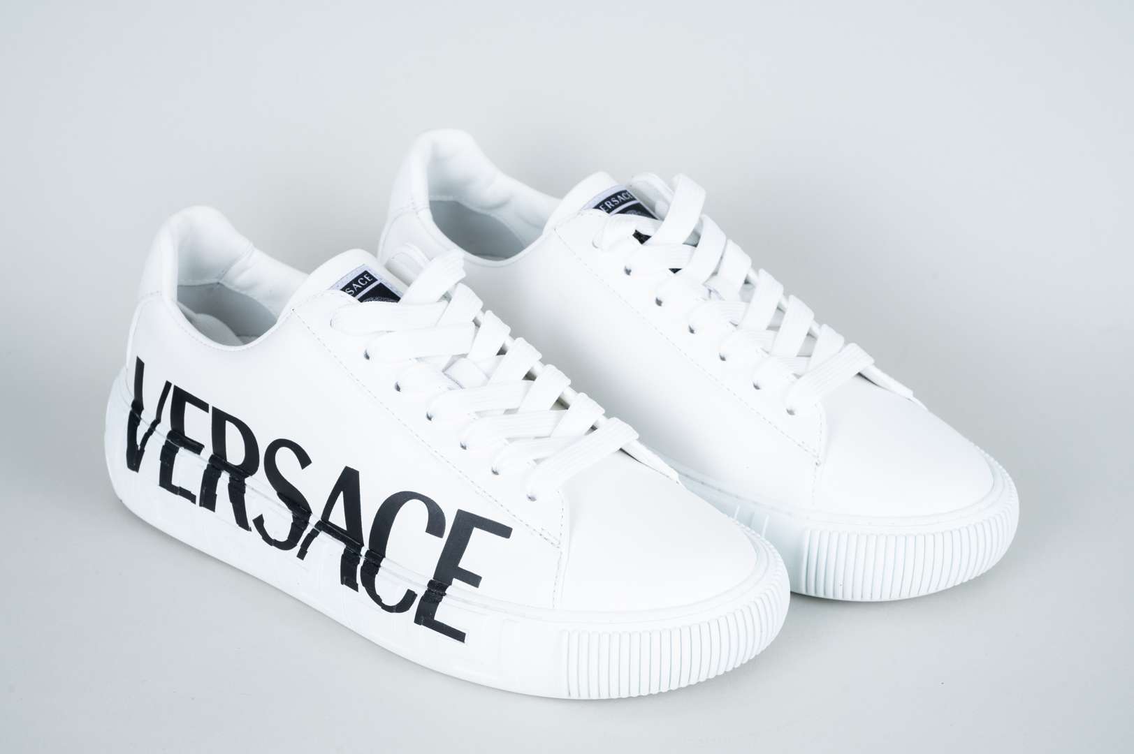 <p>VERSACE, a pair of Greca trainers</p>