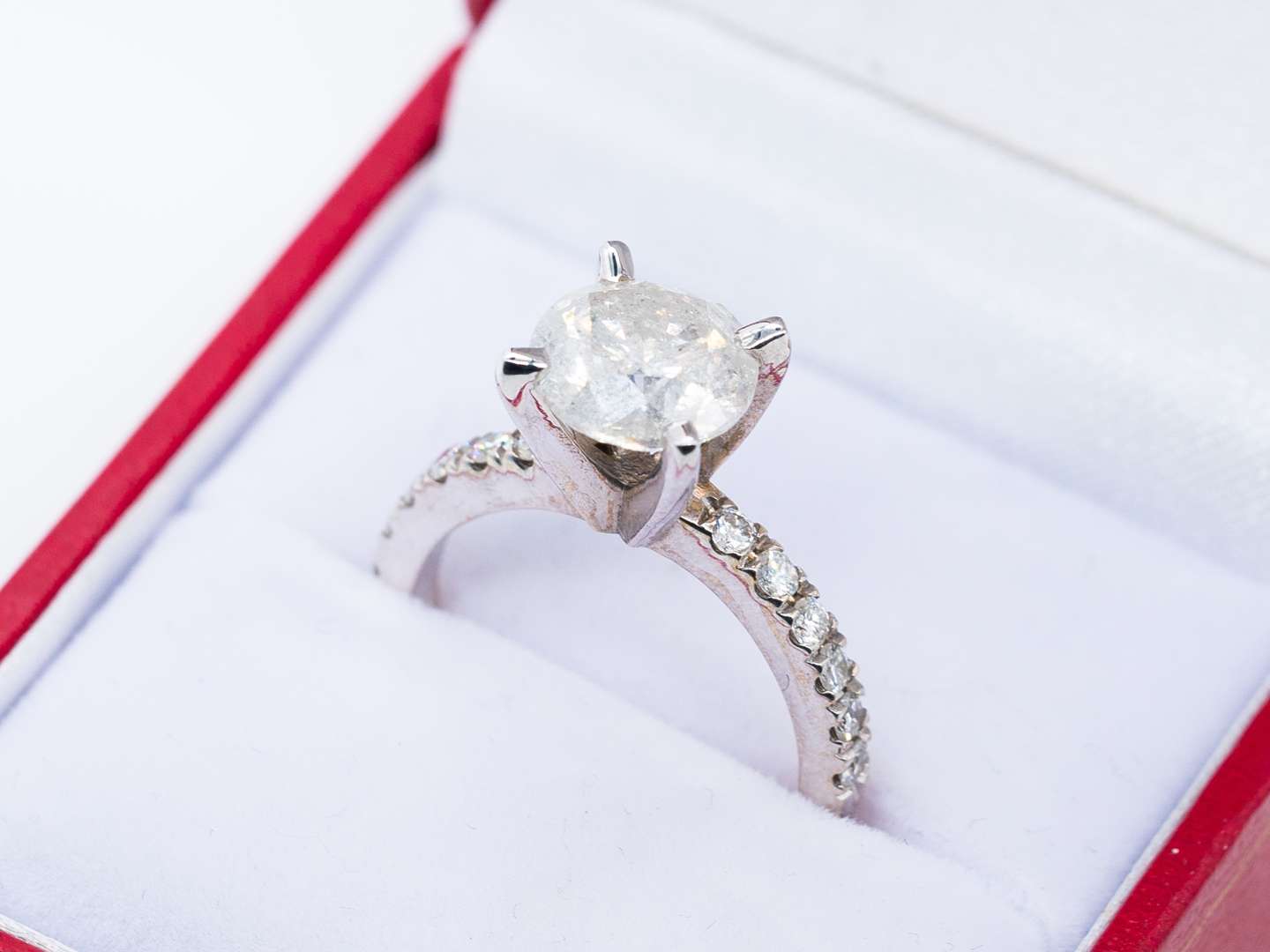 <p>A Solitaire Diamond Ring with 14ct white gold mount,</p>