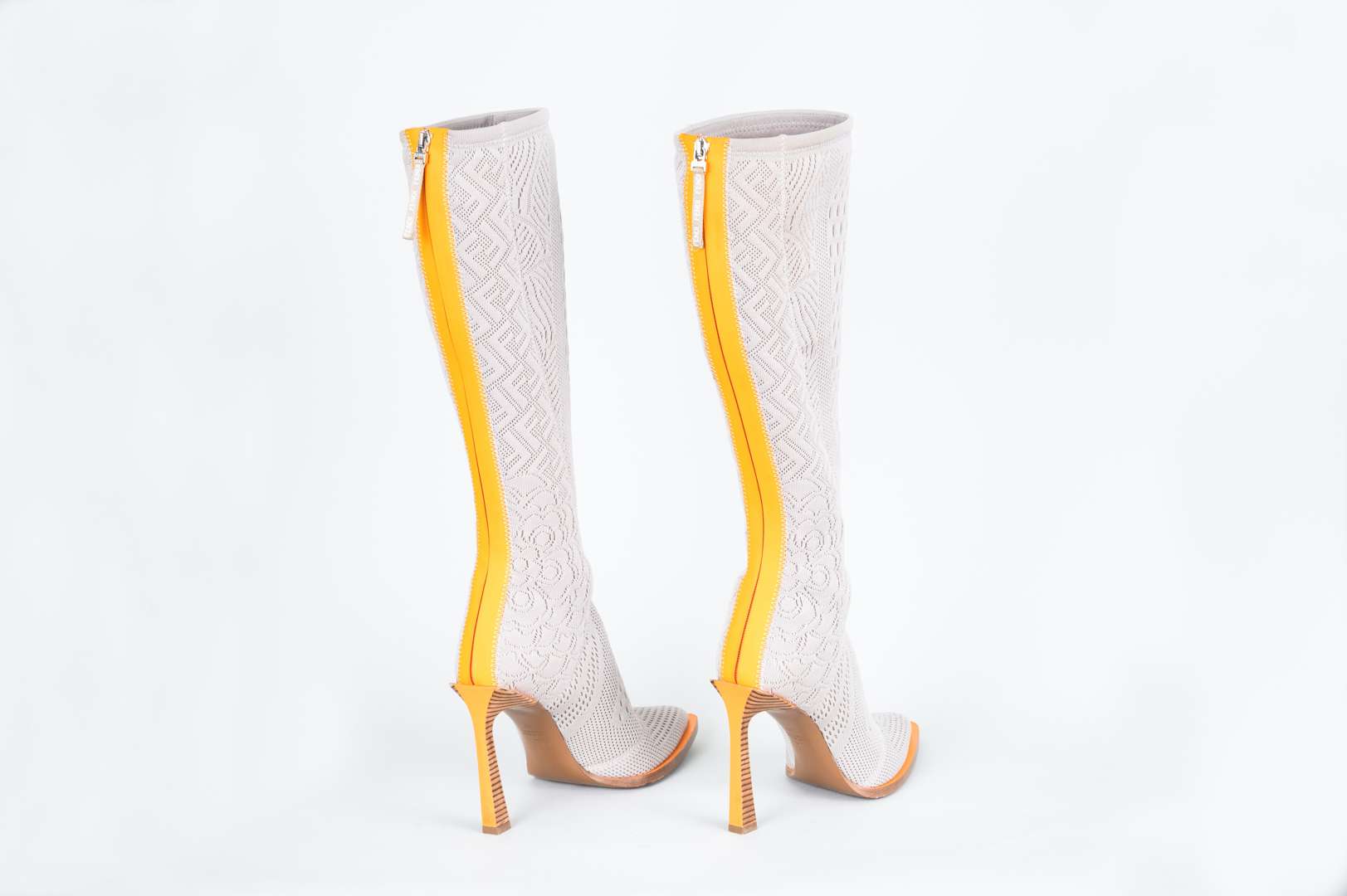 <p>FENDI, &nbsp;a pair of Fframe, knee high boots</p>