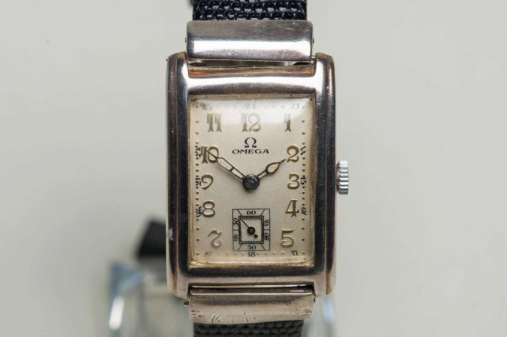 <p>OMEGA. a first half of the 20th century, rectangular silver cased wristwatch,</p>