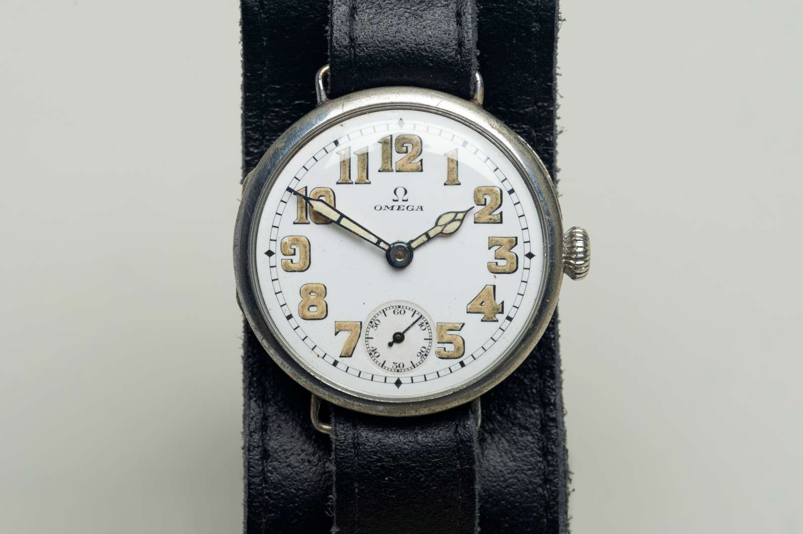 <p>OMEGA. an early 20th century base metal cased wristwatch.</p>