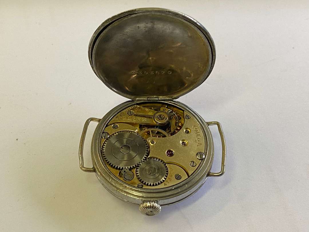 <p>OMEGA. an early 20th century base metal cased wristwatch.</p>