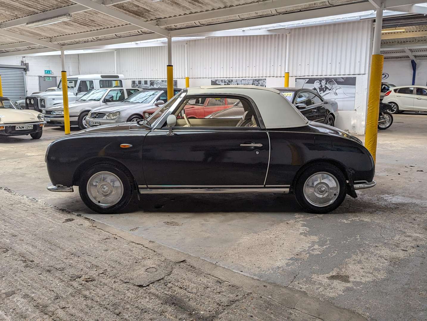 <p>1991 NISSAN FIGARO AUTO&nbsp;</p>