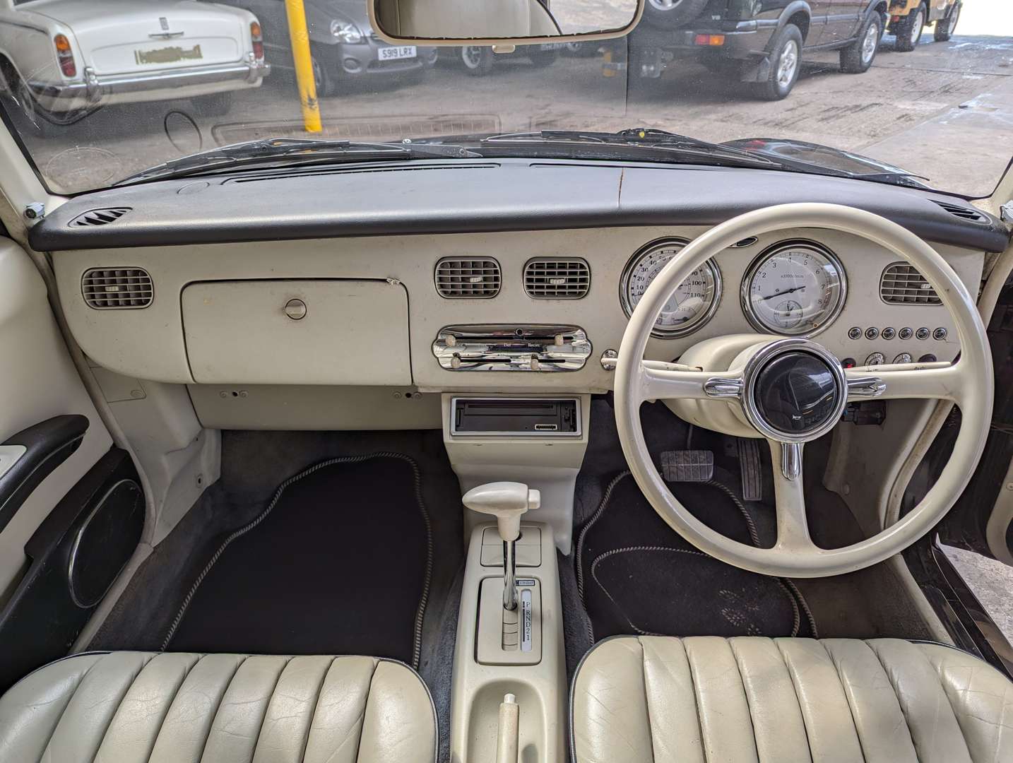 <p>1991 NISSAN FIGARO AUTO&nbsp;</p>