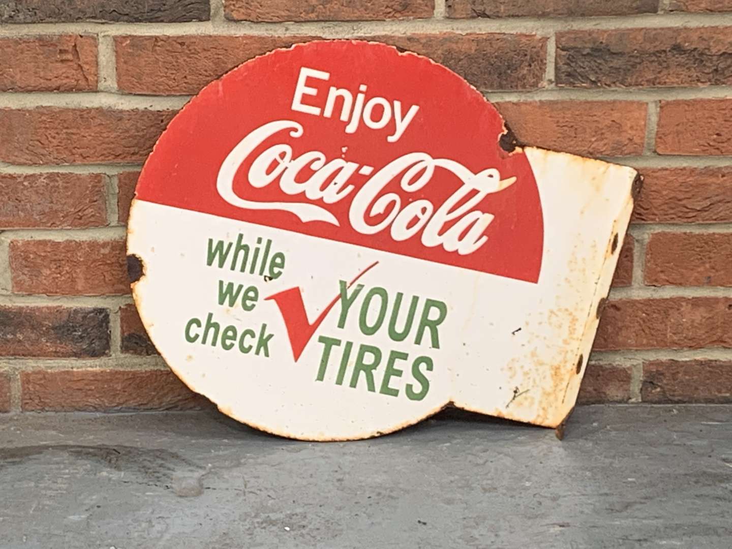 <p>Enjoy Coca-Cola Enamel Flange Sign</p>