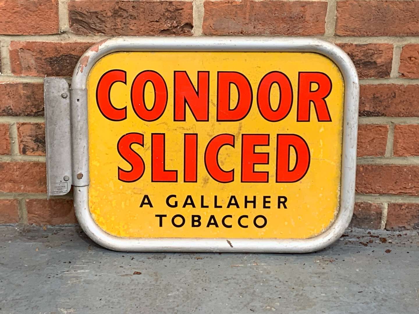 <p>Condor Sliced Tobacco Aluminium Wall Mounted Sign</p>