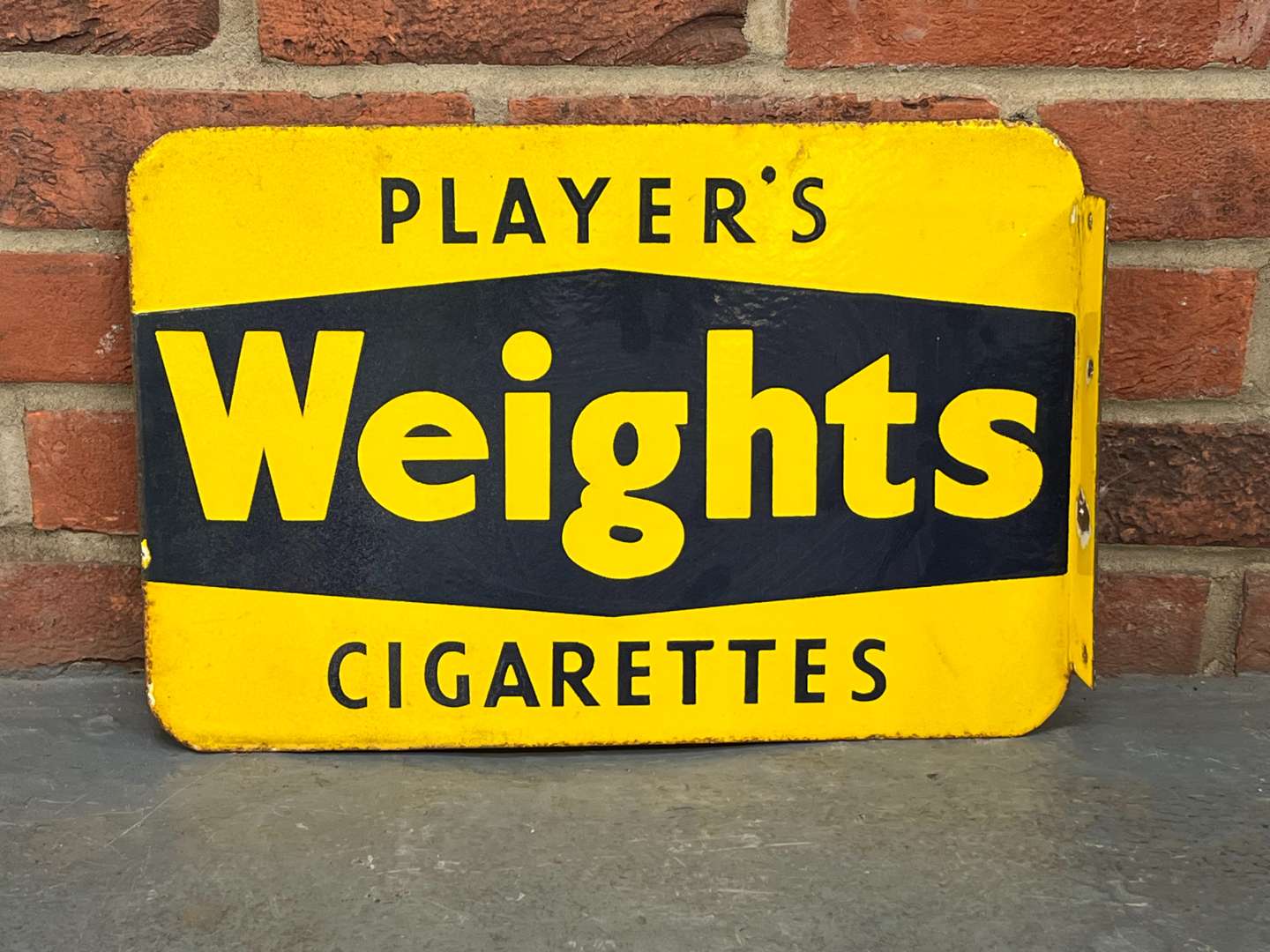 <p>Players Weights Cigarettes Enamel Flange Sign</p>