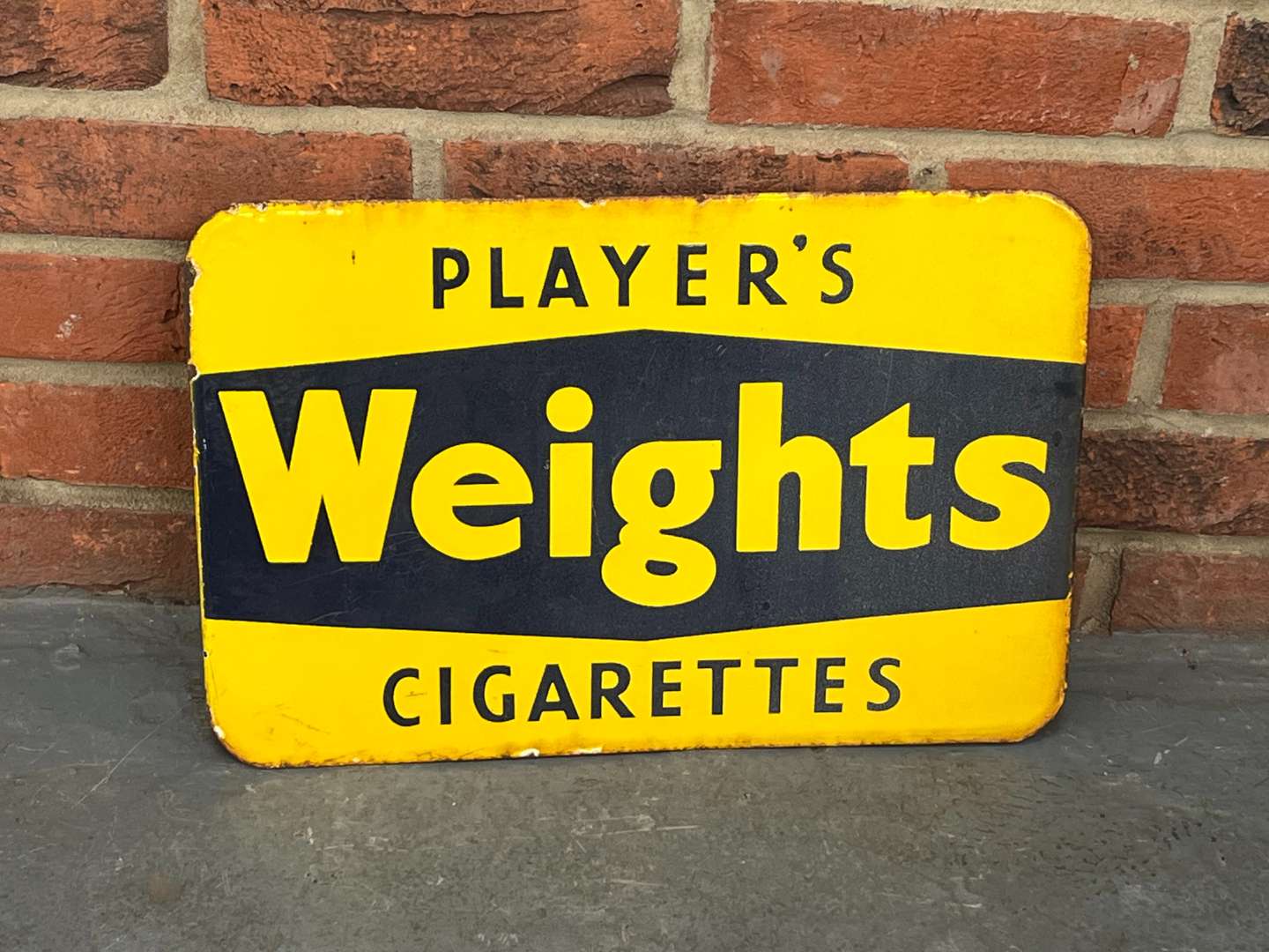 <p>Players Weights Cigarettes Enamel Flange Sign</p>