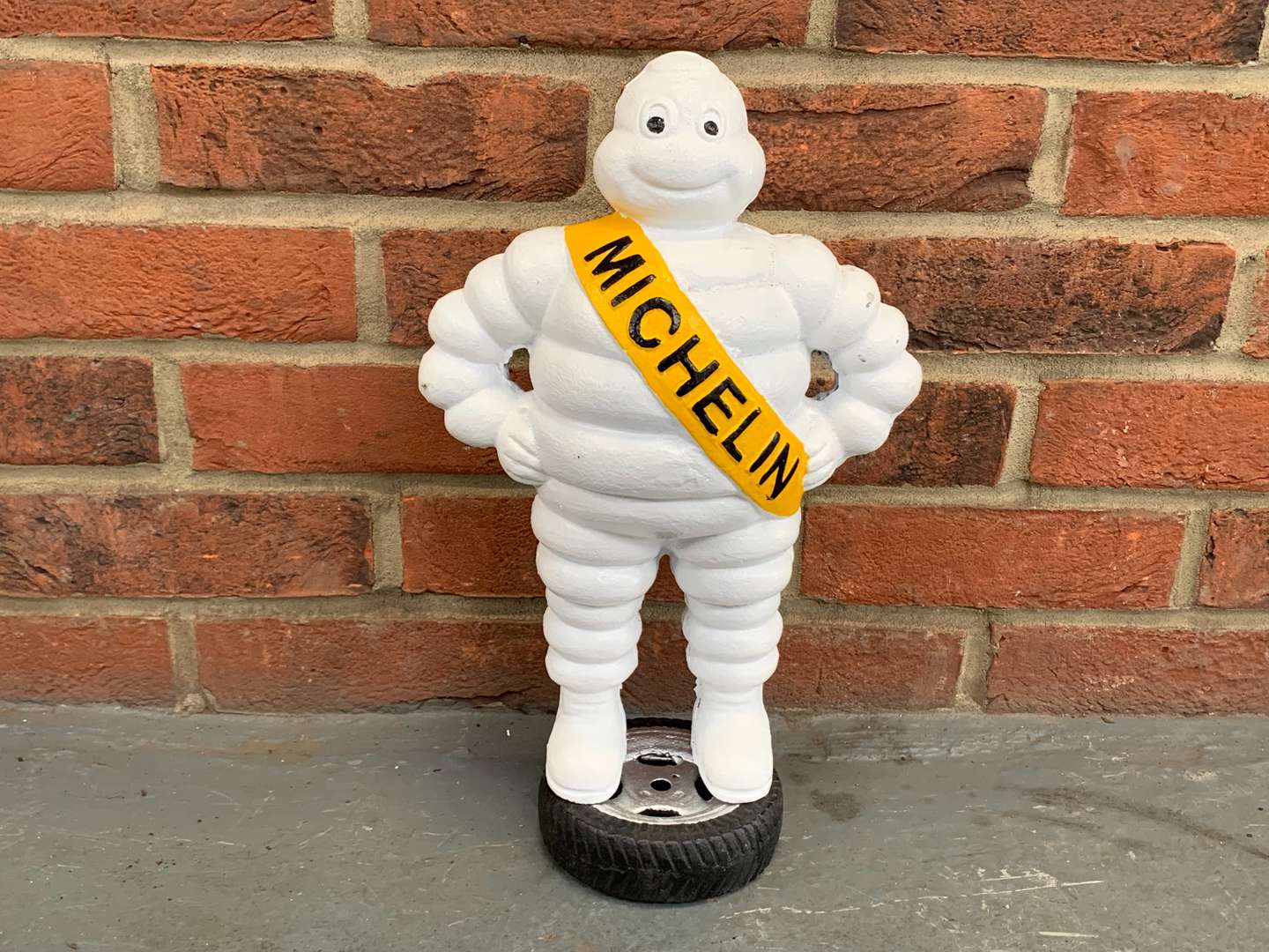 <p>Michelin Standing On A Tyre Cast Figure</p>