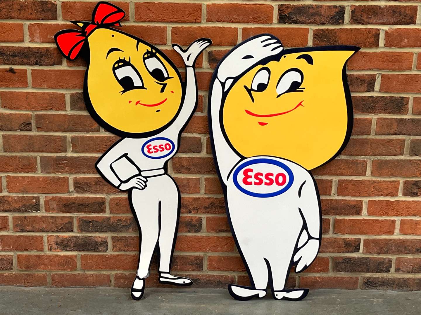 <p>Esso Mr and Mrs Drip Metal Signs</p>