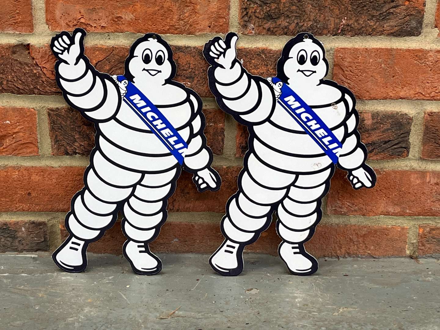 <p>Pair Of Small Michelin Men</p>