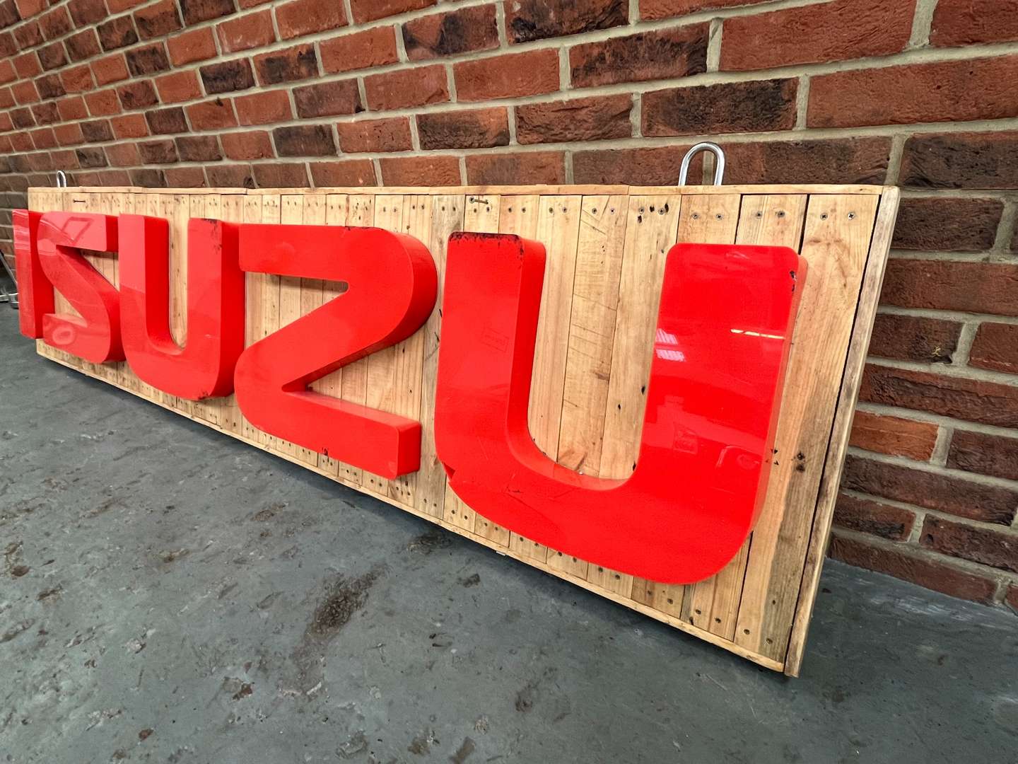 <p>Extremely Large ISUZU Illuminated Sign a/f</p>