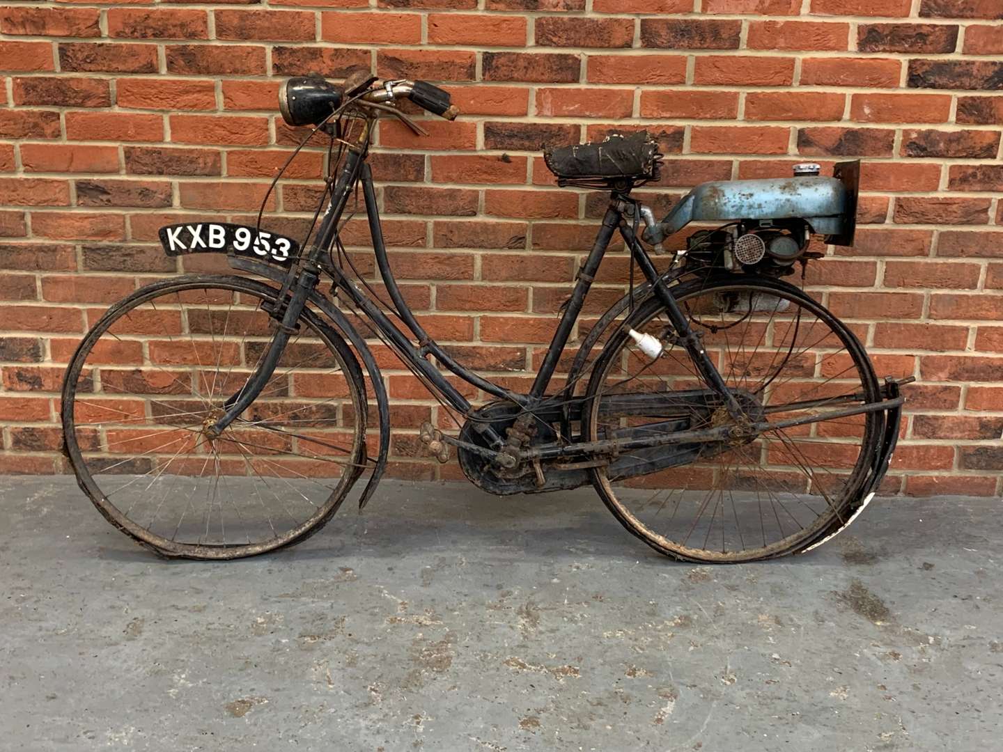 <p>Trojan Mini Motor Attached to a Vintage Bicycle</p>