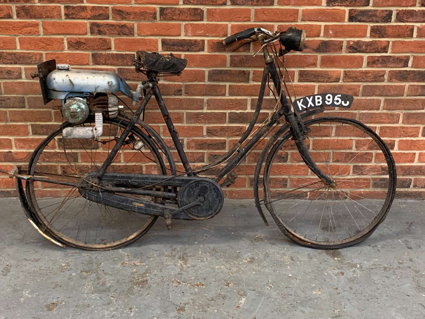 <p>Trojan Mini Motor Attached to a Vintage Bicycle</p>