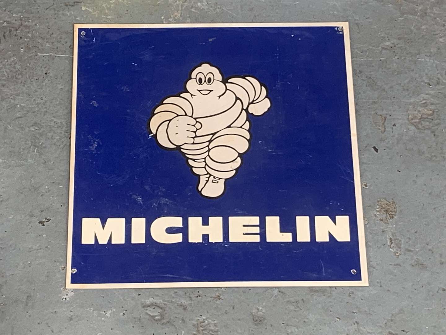 <p>Two Small Michelin Signs</p>