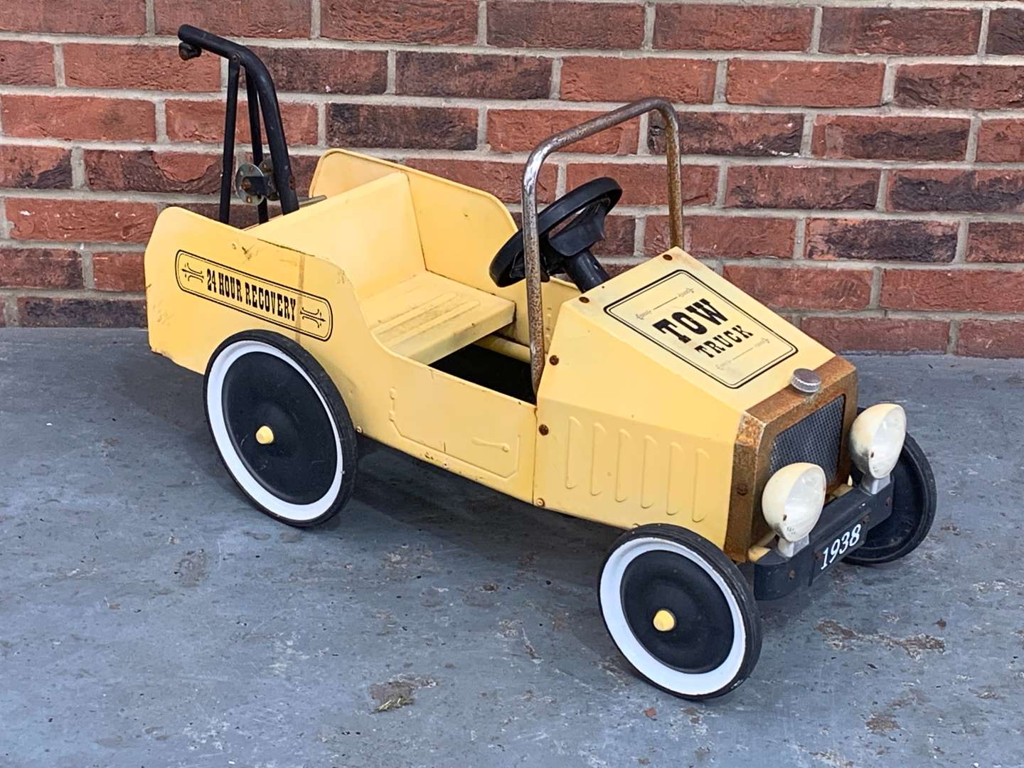 <p>Tin Plate Childs Pedal Tow Truck</p>