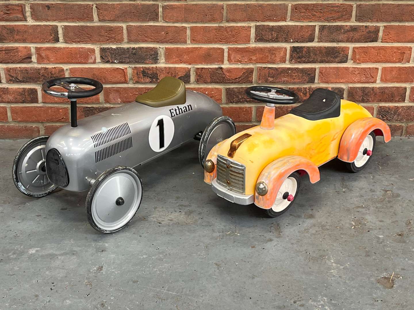 <p>Two Vintage Styled Childrens Cars</p>